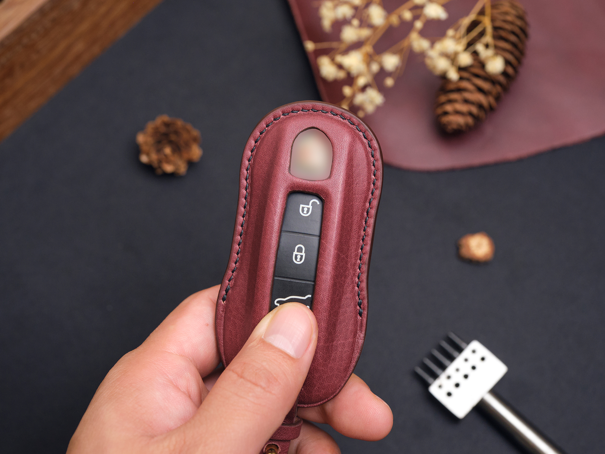 Porsche Cayenne key fob cover protecting the key from impacts and scratches