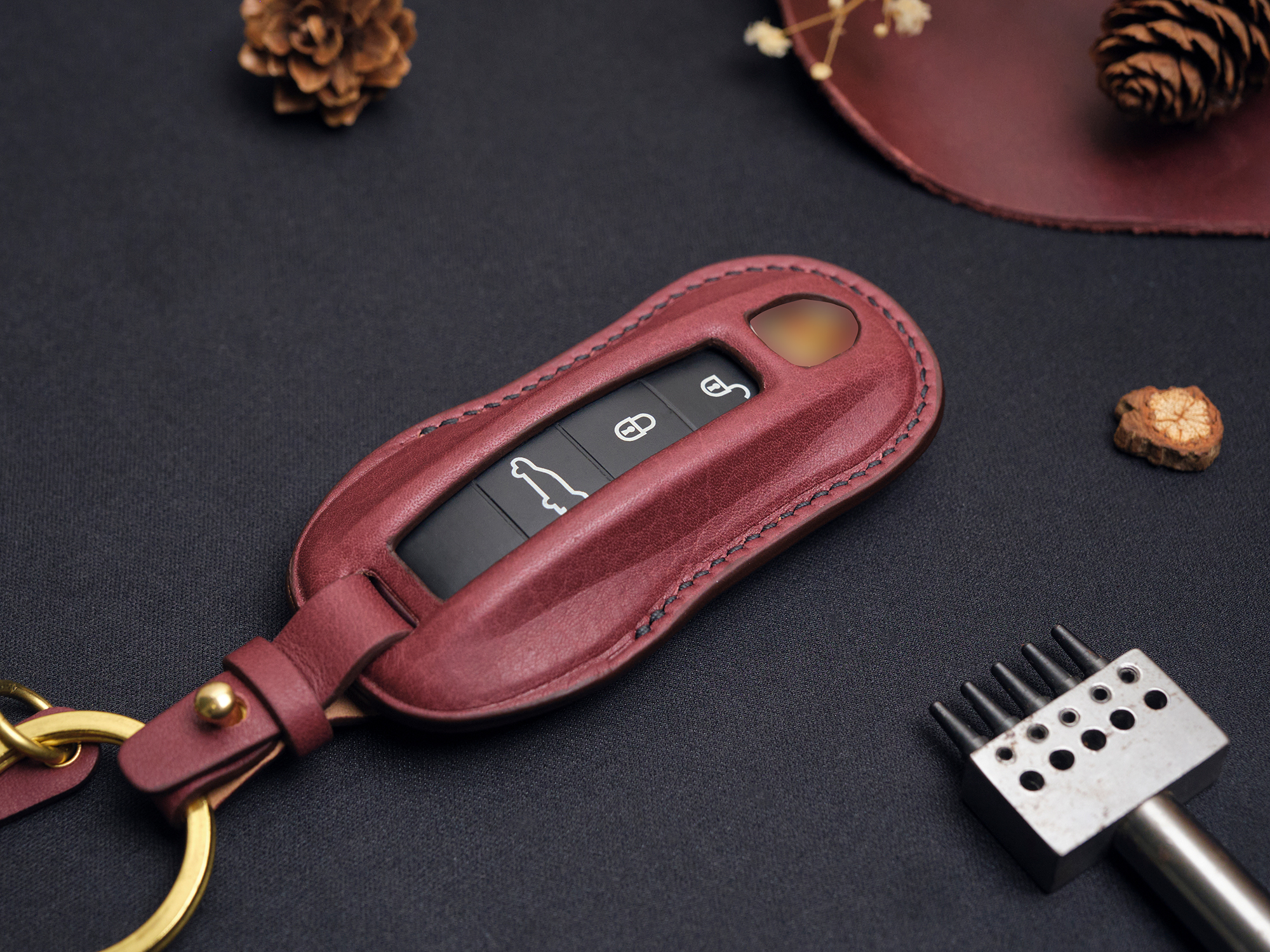 The Porsche Cayenne key fob cover is crafted from high-quality, imported Veg-tanned leather, offering a premium and durable finish.