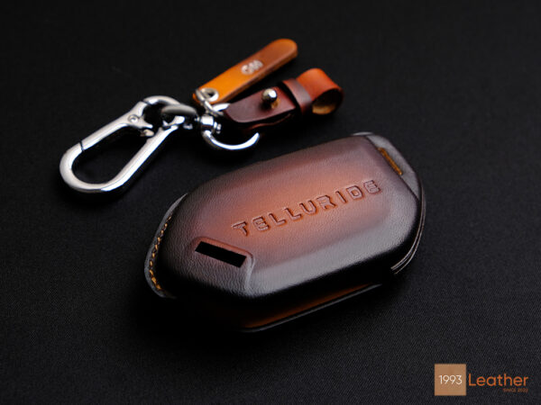 This is a premium handcrafted KIA key fob cover that you can't miss