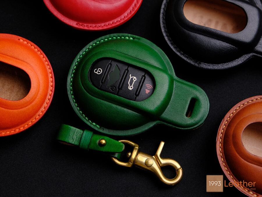 Handcrafted key fob cover for Mini 3-Door Hatch made of eco-friendly veg-tanned leather in vibrant colors.