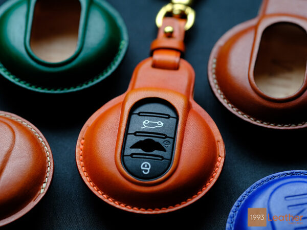 Handcrafted Mini Countryman key fob covers in various colors, designed for durability and style at Leather1993.