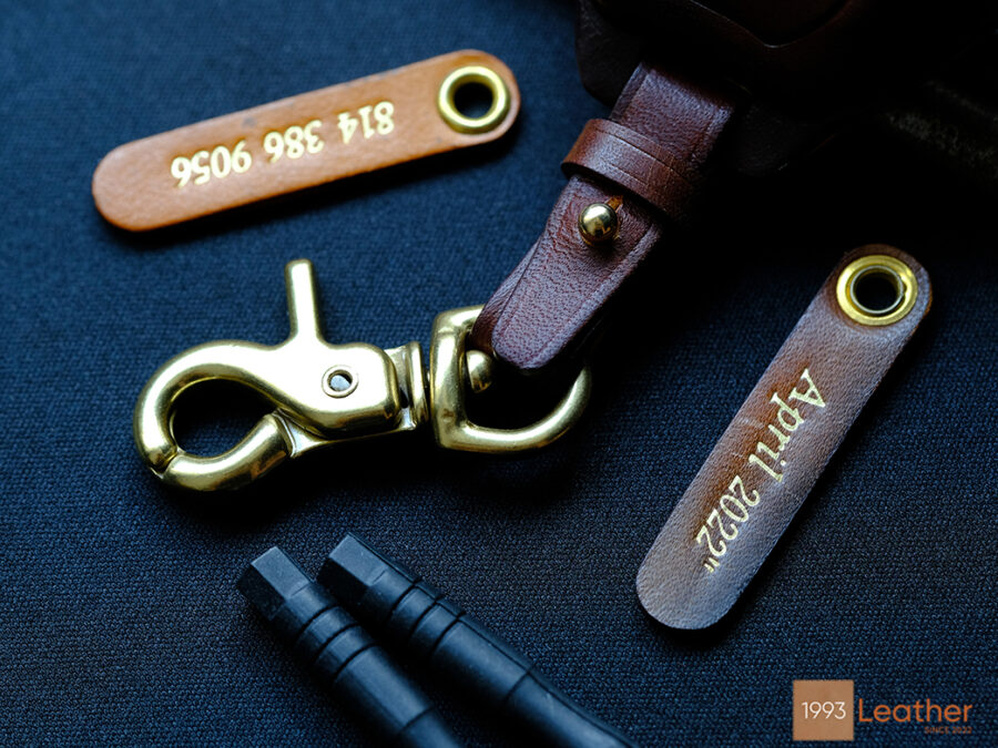 Peugeot 3008 key fob cover made of top-class leather, featuring an engraved tag and four hardware options for customization.