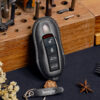 The Porsche 718 leather key case highlights smooth texture, ergonomic design and premium craftsmanship.