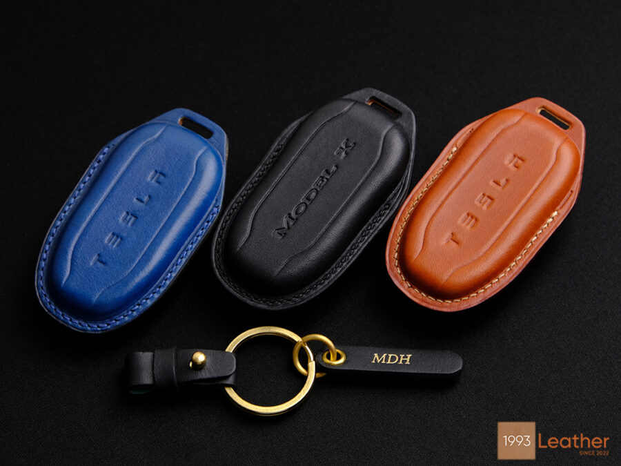 Tesla Model S key fob cover with a free engraved name tag and 4 customizable hardware options.