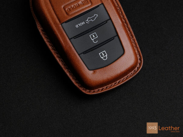 Toyota Tundra key fob cover made of premium leather, highlighting exquisite stitching craftsmanship.