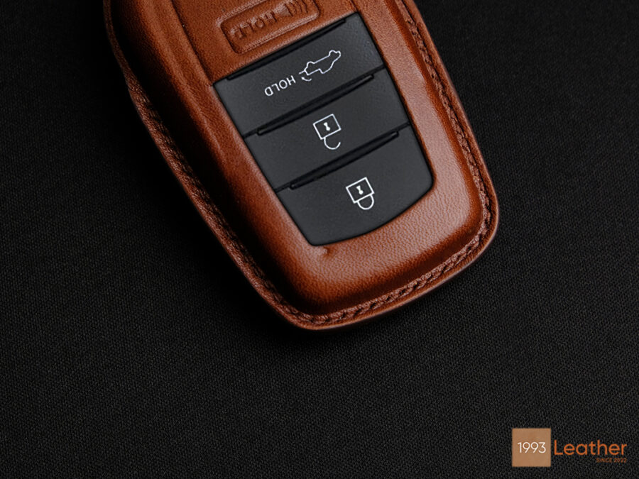 Toyota Tundra key fob cover made of premium leather, highlighting exquisite stitching craftsmanship.