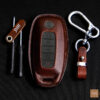 Nissan Pathfinder key fob cover made of premium Veg-tanned leather, showcasing natural elegance.