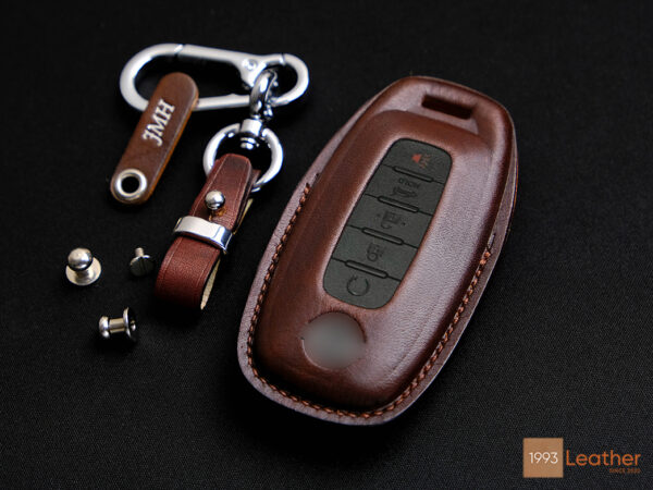 Nissan Pathfinder key fob cover featuring fine and detailed stitching for a refined appearance.