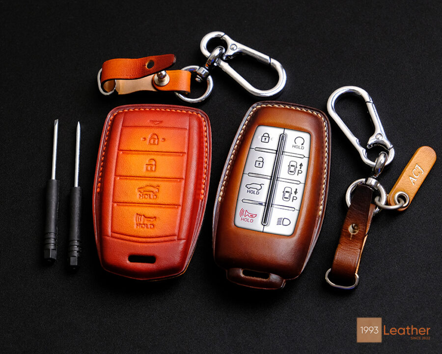 Fully-covered and exposed-button designs of the key case