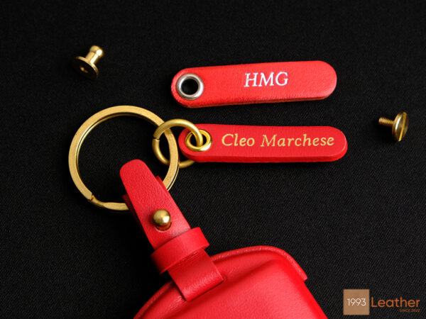 Mazda CX-30 key fob cover with four keychain options and a customizable name tag, available in high-quality leather.