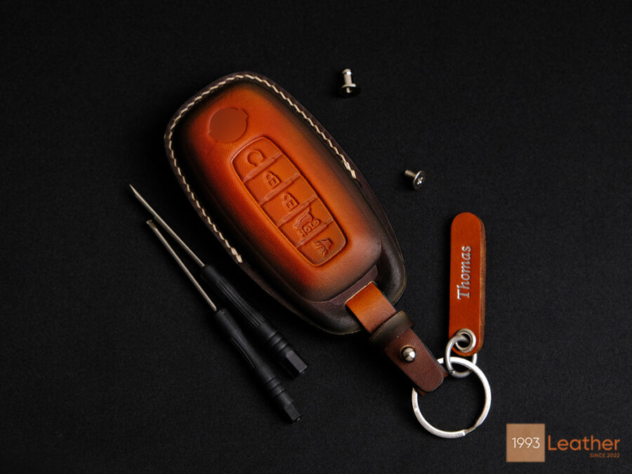 Nissan Rogue key fob cover made of top-quality Vegtan leather for durability and style.