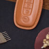 Nissan Rogue key fob cover featuring exquisite stitching for a refined touch.