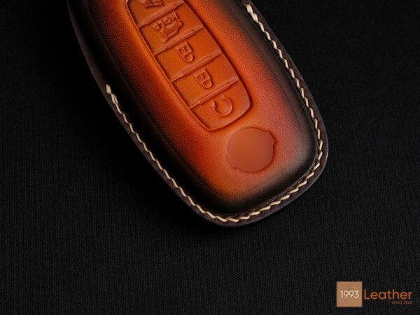 Nissan Rogue key fob cover featuring exquisite stitching for a refined touch.