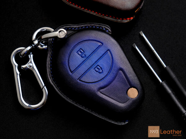 Premium Electra Glide key fob cover made from imported veg-tanned leather, offering durability and elegance.