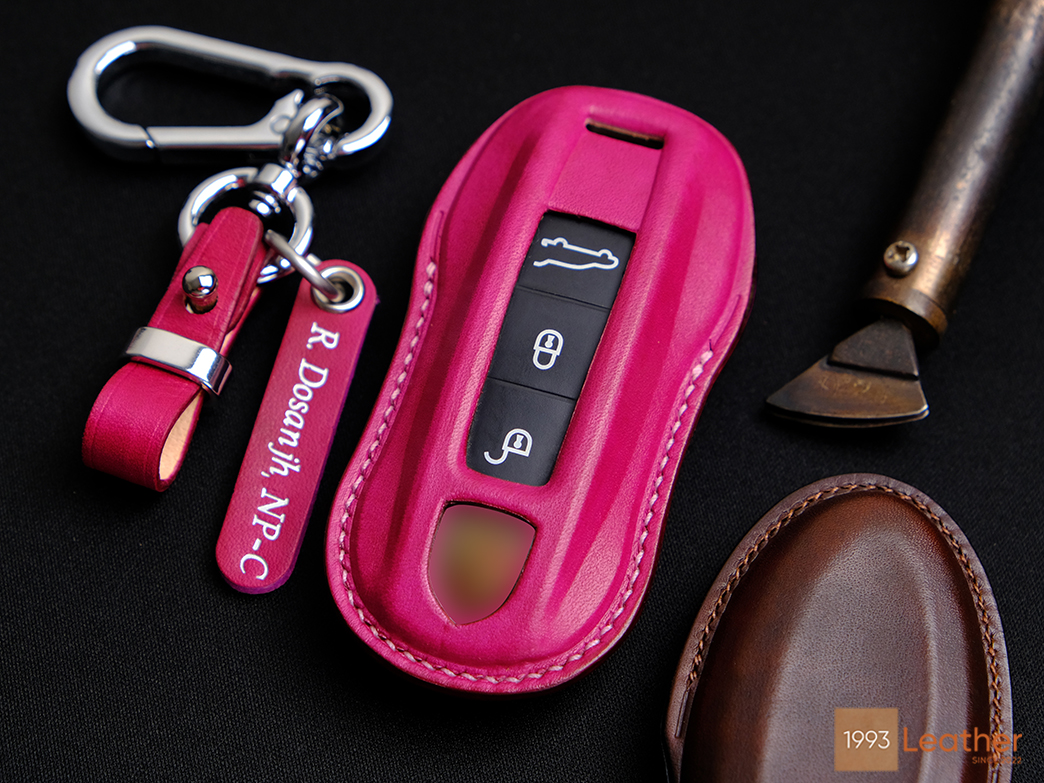 Porsche Macan key fob cover with free name tag engraving and four hardware options available.