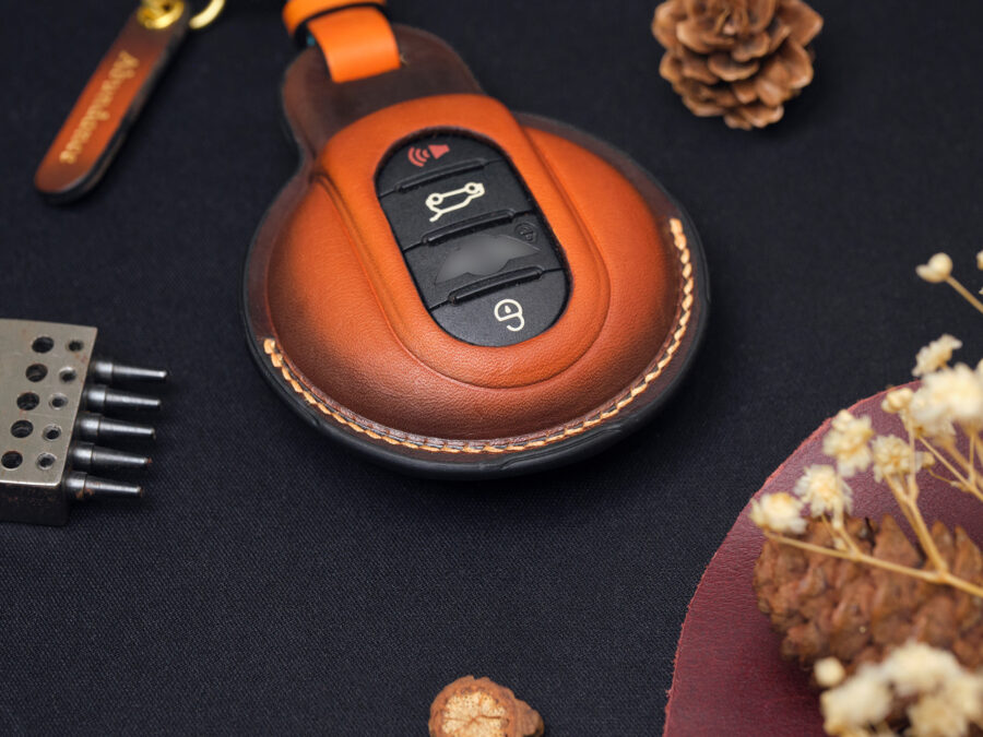 Close-up view of handcrafted Mini Clubman key fob covers with neat stitching representing the craftsmanship at Leather1993.