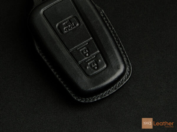 Toyota RAV4 key fob cover featuring precise and intricate stitching for a refined look.