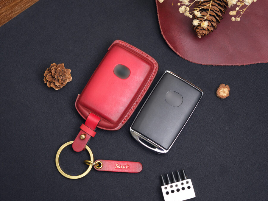 Genuine leather Mazda CX-60 key fob cover with a gradient brown finish, detailed stitching, and an elegant design.