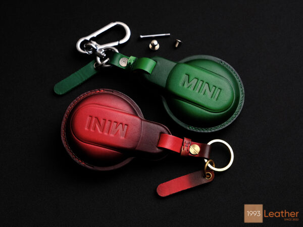 Mini JCW key fob cover crafted from premium Veg-Tanned leather, available in Buttero, Nappa, and Epsom leather options.