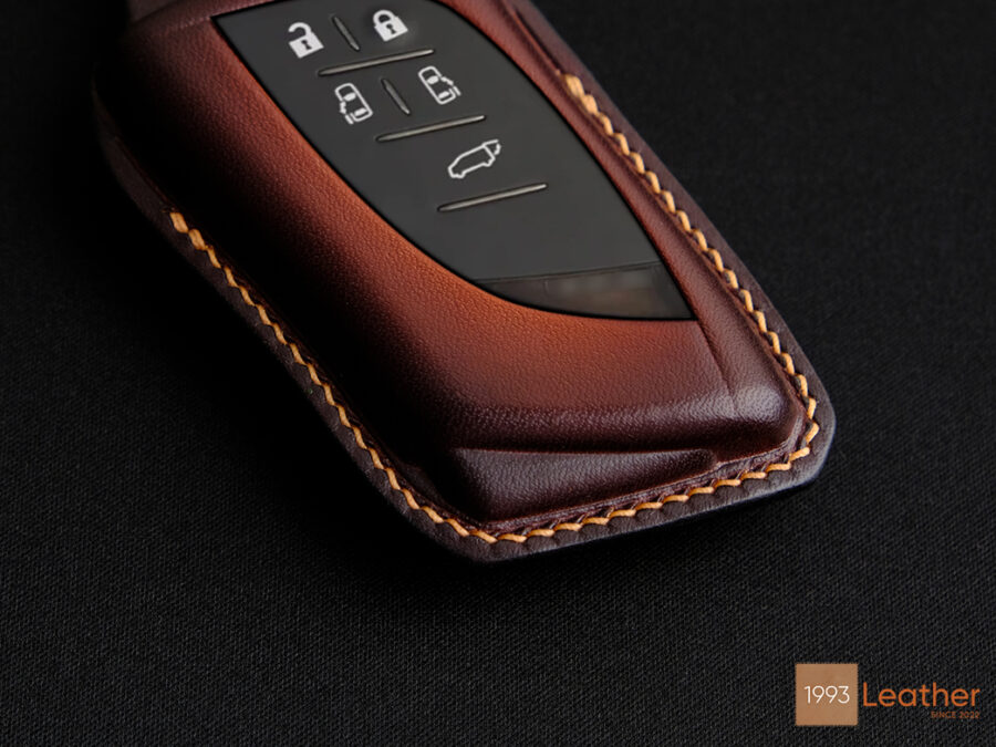 Every stitch is meticulously crafted to showcase the luxury of the key fob cover.