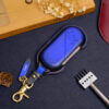 Mini Aceman key fob cover in Patina Blue leather with custom name tag and stylish keyring