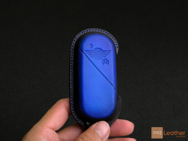 Mini Aceman key fob cover in Patina Blue leather, designed for maximum key protection.