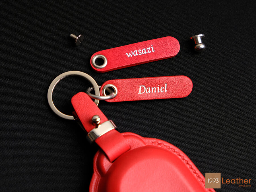 Customizable red Mini Cooper SE key fob cover with free tag engraved and hardware options for personalization