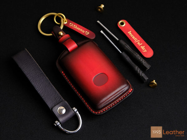 High-quality Veg-Tanned leather Mazda 2, 3, 6 key fob cover in attractive patina red colors with customizable options.