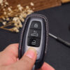 High-quality handmade Audi A-series key fob cover with fully-covered design has maximum protection with keychain and engraved tag