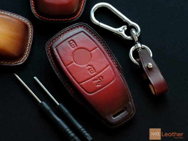 A luxurious Mercedes E-Class key fob cover made of premium Veg-Tanned leather, designed for style and durability.