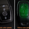 Mercedes E-Class key fob cover displayed in two styles: basic color palette in black and Patina color palette in green, representing top-quality leather craftsmanship.