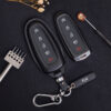 The front side of slim and compact Ford Explorer key fob cover made of premium Vegtan leather with keychain and tag