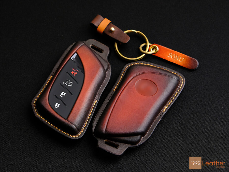 Exposed button design key fob cover for the Lexus LX.