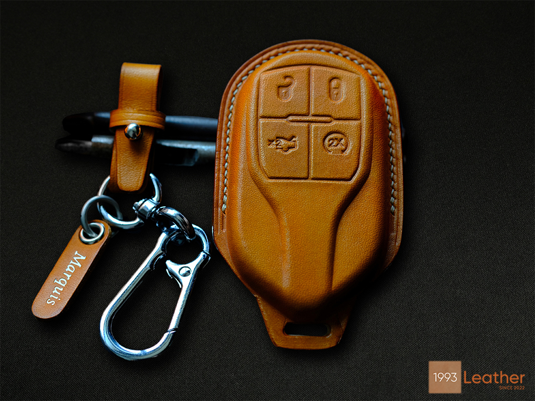 The Maserati Quattroporte leather key case is made from high-quality leather with a beautiful design.