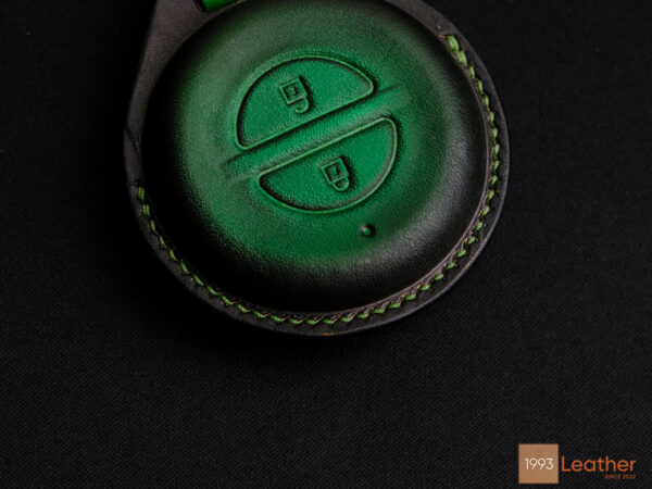 Indian Pursuit key fob cover featuring precise and durable hand-stitched details for a refined look.