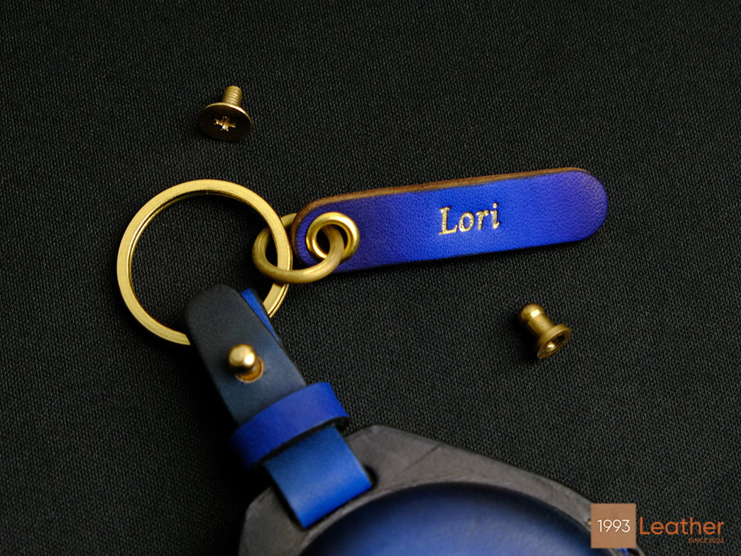 Indian Key Fob Cover featuring a custom name tag and four hardware choices.