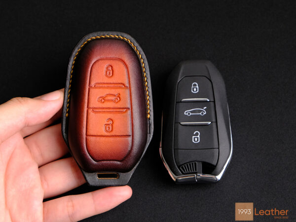 Durable Peugeot 2008 key fob cover offering premium scratch protection with a sleek design.