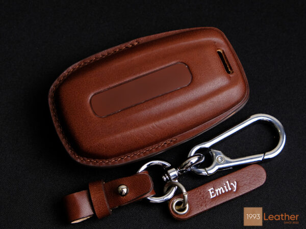 Premium RAM 1500 leather key fob cover with a free personalized tag and four hardware options.