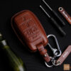 Premium RAM 1500 key fob cover crafted from high-quality leather, featuring elegant hardware and personalized engraving.