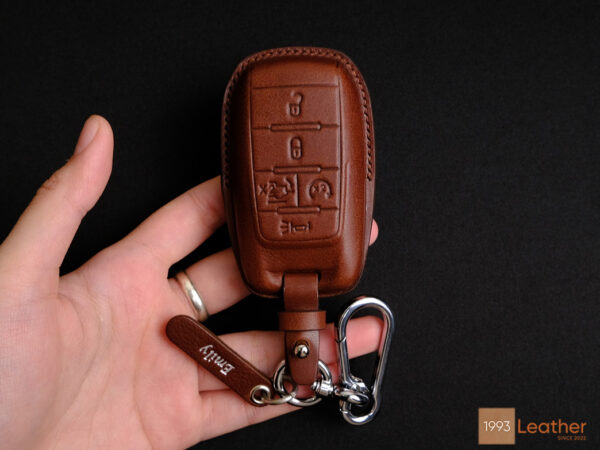 High-quality leather key fob cover for RAM 1500, featuring durable stitching and a sleek design.