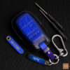 RAM 2500 key fob cover made of imported veg-tanned leather in deep blue, featuring a polished design and durability.