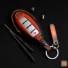 Nissan Maxima key fob cover made of premium Veg-Tanned leather.