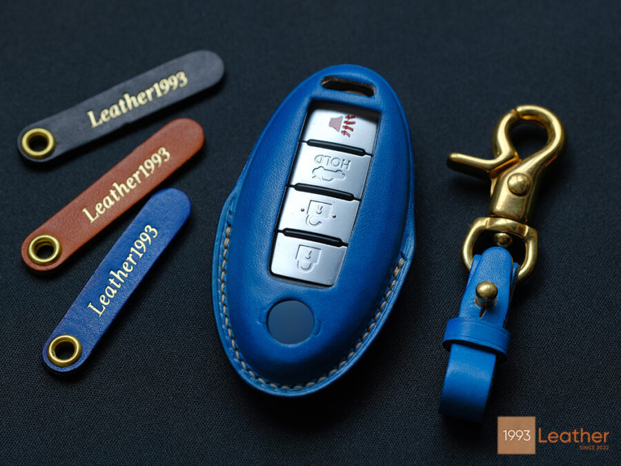 Nissan Versa key fob cover crafted with luxurious leather for a premium look and feel.