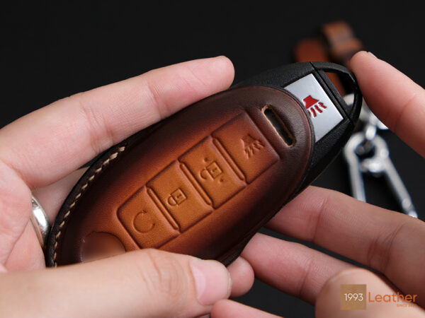 Easy to place Nissan Armada key on the leather key fob cover