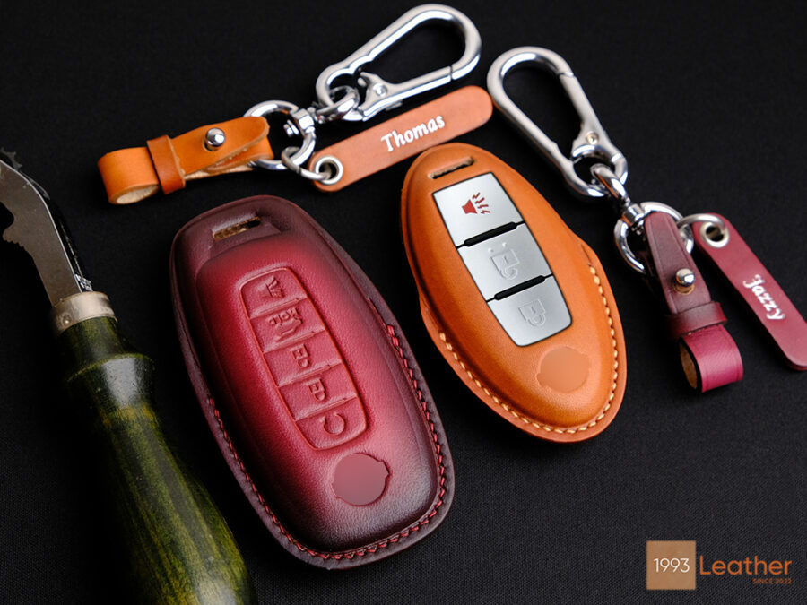 Nissan Frontier key fob cover crafted of high-end Veg-tanned leather for enduring style.