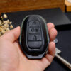 Premium Peugeot 408 key fob cover providing scratch protection.