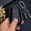 Close-up of Peugeot 408 Key Fob Cover highlighting exquisite stitching.