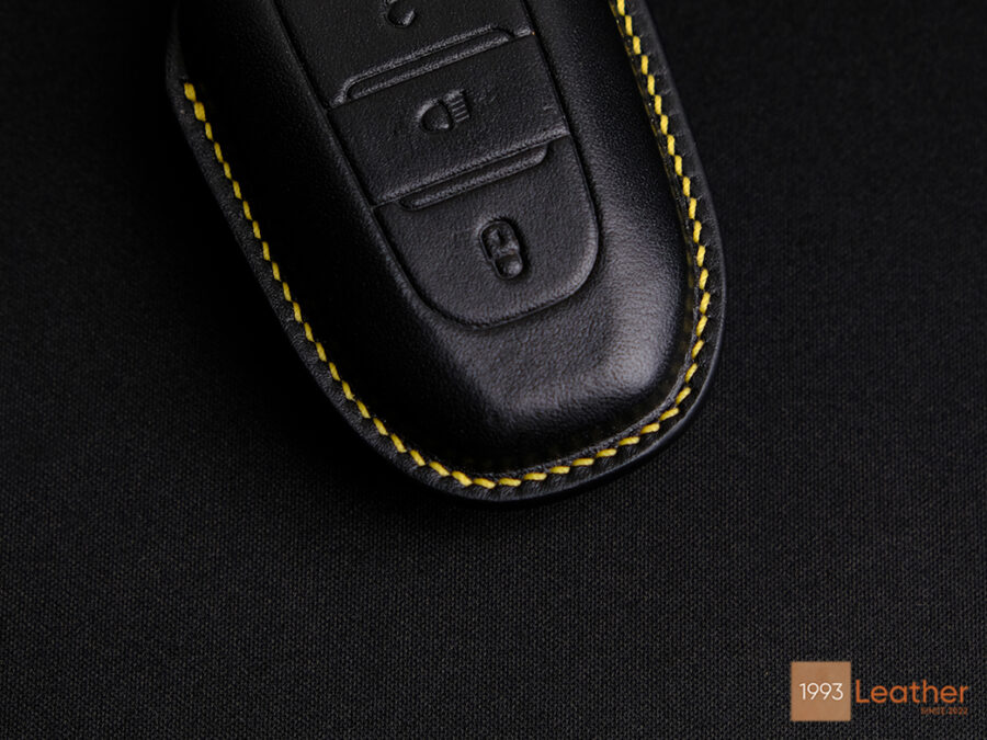 Close-up of Peugeot 408 Key Fob Cover highlighting exquisite stitching.