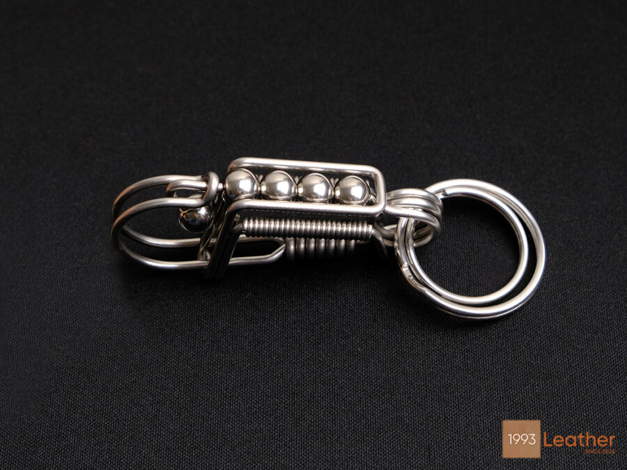 304 stainless steel keychain featuring a durable ball-lock mechanism for secure key attachment.