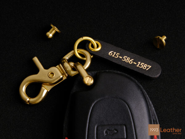 Toyota Vios key fob cover with a free engraved tag and four hardware options for customization.